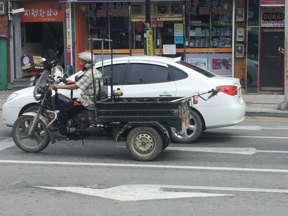 WE also so this neat little vehicle cruising along the main street of Buan. 